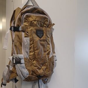 Quest Hydration Dark Tan and Grey Backpack.